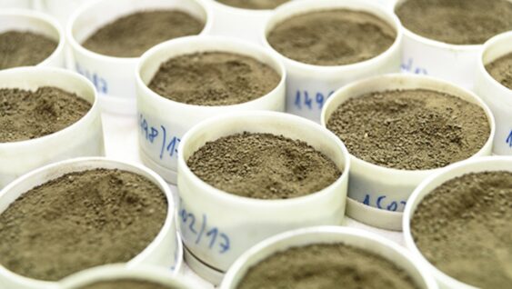 Several containers with soil samples for testing in the laboratory.