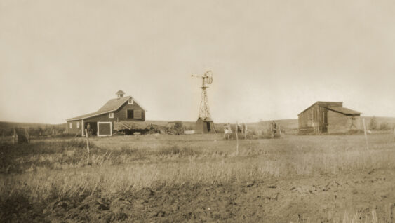 Antique photograph of homestead farmyard. Original antique photograph snapshot of the farmyard on a homestead in North Dakota. Taken circa 1899.