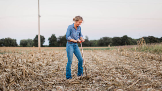 Female Farmer Taking Soil Sample