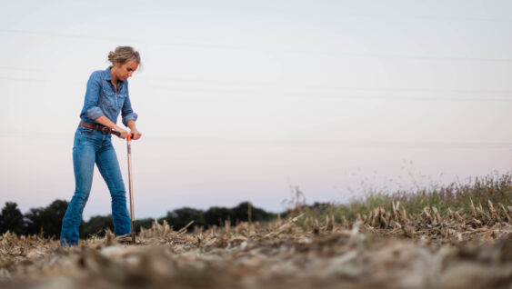 Female Farmer Taking Soil Sample
